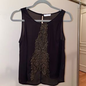 Lush top with gold detail on the front